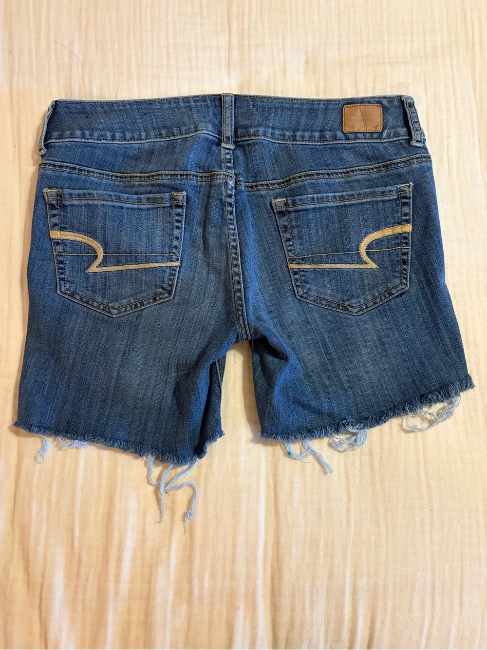 American Eagle Outfitters “Artist” Distressed Blue Denim Cutoff Shorts